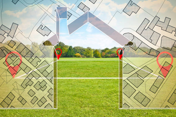 Land plot management - Imaginary city map with buildings, land parcels and home silhouette - real estate concept with a vacant land on a green field available for building construction in a residential area for sale